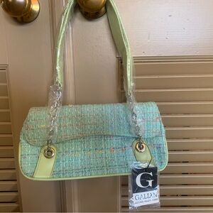 NWT Galian purse. Fun colors and in mint condition.